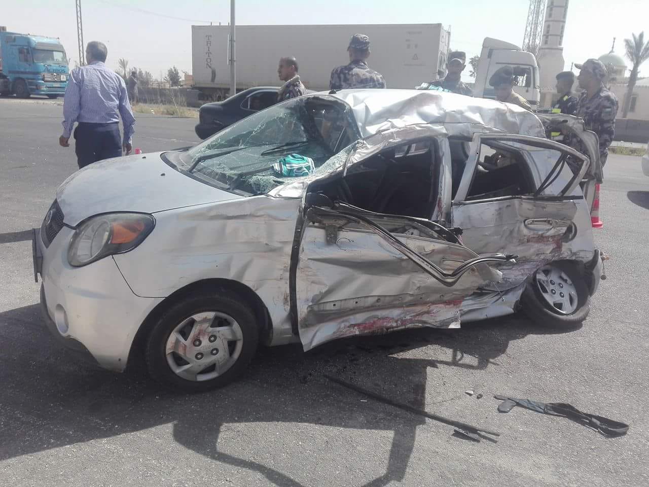 بالصور...وفاة وإصابة بحادث تصادم بين مركبتين بالجيزة.