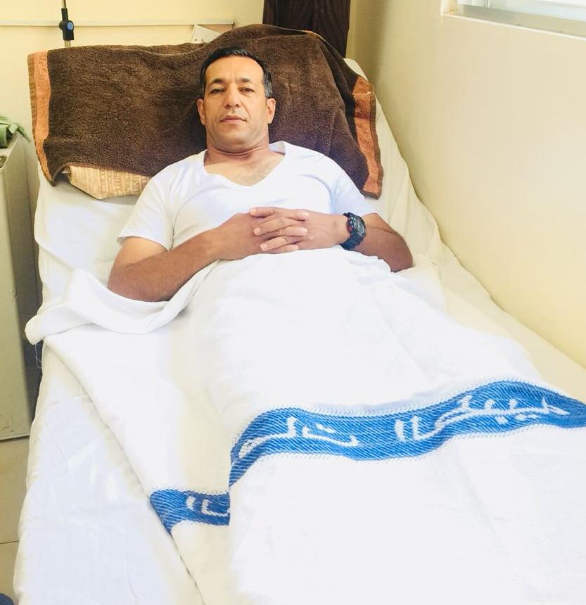 القضاه على سرير الشفاء في مدينة الحسين الطبية.