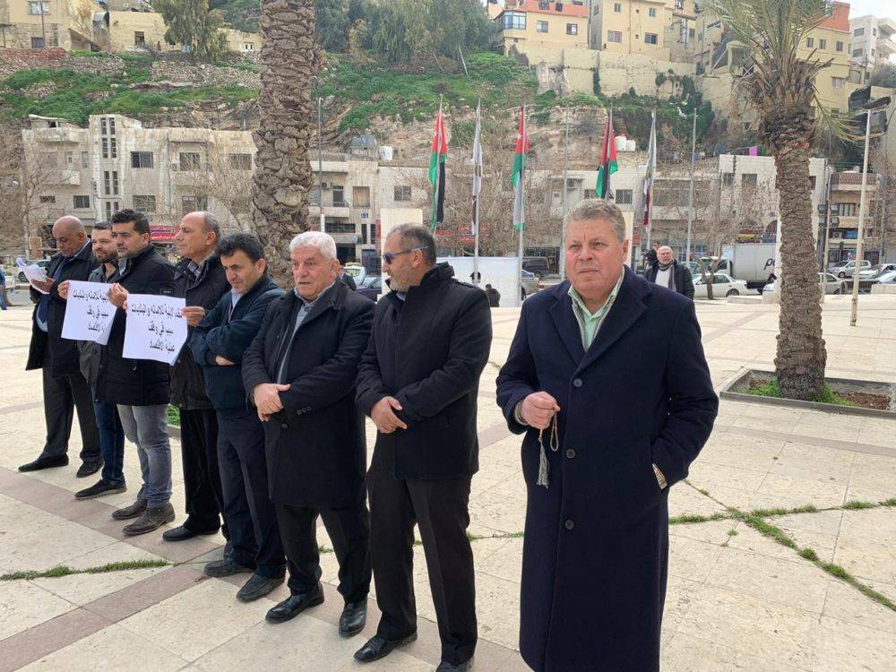 بالصور : اعتصام امام امانة عمان للمطالبة بوقف العمل بنظام الابنية لمدينة عمان