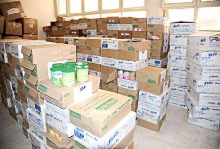 توزيع مساعدات على أسر داهمتها مياه الأمطار في مأدبا