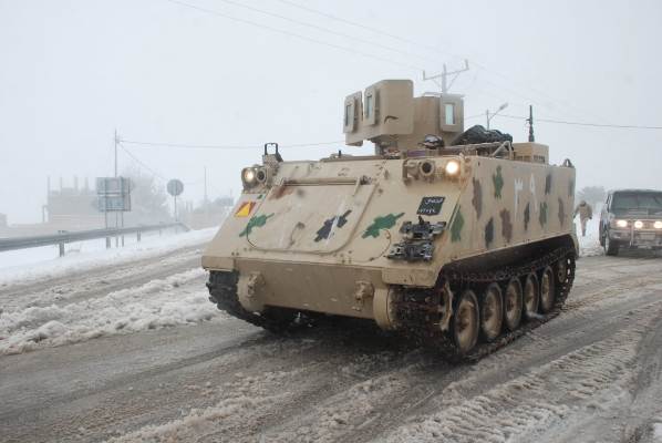 الجيش يساهم  في تخطي آثار الظروف الجوية في  الطفيلة... صور