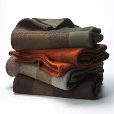 حملة لتوزيع الألبسة الشتوية على اللاجئين السوريين في الطفيلة