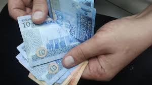 الطفيلة: توزيع الرواتب الشهرية لمنتفعي المعونة الوطنية