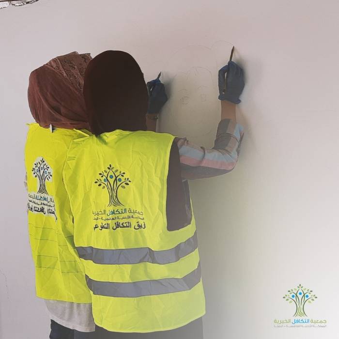 فريق التكافل التطوعي ينهي مبادرة الرسم و الكتابة على الجدران