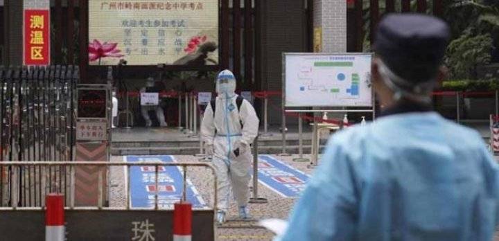 بكين تشدد إجراءاتها لكبح انتشار كوفيد 19