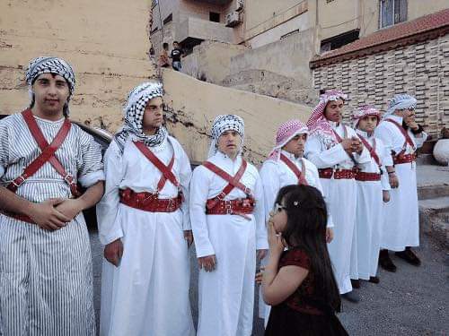 عروسان اردنيان يكرمان ذوي متلازمة داون _صور