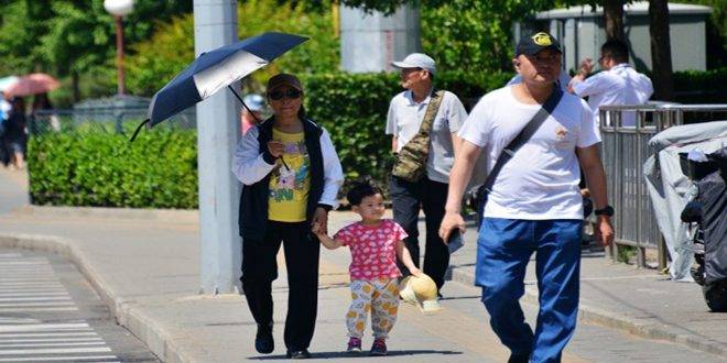 استمرار التحذيرات في بعض مناطق الصين من درجات الحرارة المرتفعة