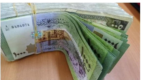 سوريا تخفض سعر الصرف الرسمي لليرة