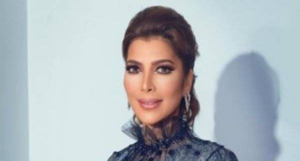 أصالة نصرى تجيب عن سر تغيير ملامح وجهها وخلعها لحذائها فى حفل دبى