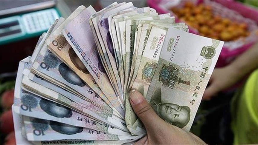 الصين تحدد سعر الدولار مقابل اليوان عند 7.2555
