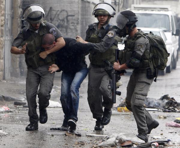 اصابات بمواجهات في طوباس والاحتلال يعتقل 14 فلسطينيا