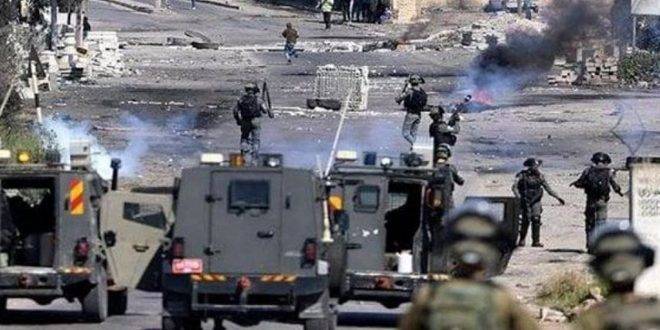 إصابة عشرات الفلسطينيين باعتداء للاحتلال ومستوطنيه في الضفة الغربية