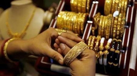 40 دينارا سعر جرام الذهب عيار 21 محليا الأربعاء
