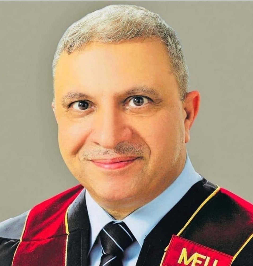 ابو دلو يهنئ  كامل خو رشيد بالترقية إلى رتبة استاذ دكتور