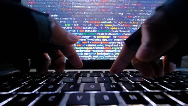 بريطانيا تتهم الصين بتنفيذ هجومين خبيثين