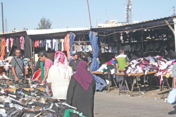 محافظ الزرقاء مصادرة البسطات المخالفة والمعيقة للمشاة