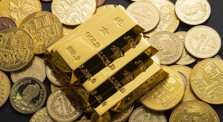 تراجع أسعار الذهب عالميا مع تحسن شهية المستثمرين للمخاطرة وارتفاع الدولار