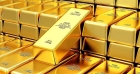 الذهب يهبط ويتجه لخسارة أسبوعية مع صعود الدولار