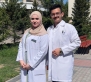 محمد القضاة يهنئ الدكتور عبد الله والدكتورة ضحى بتخرجهما من جامعة كاراجندا الطبية