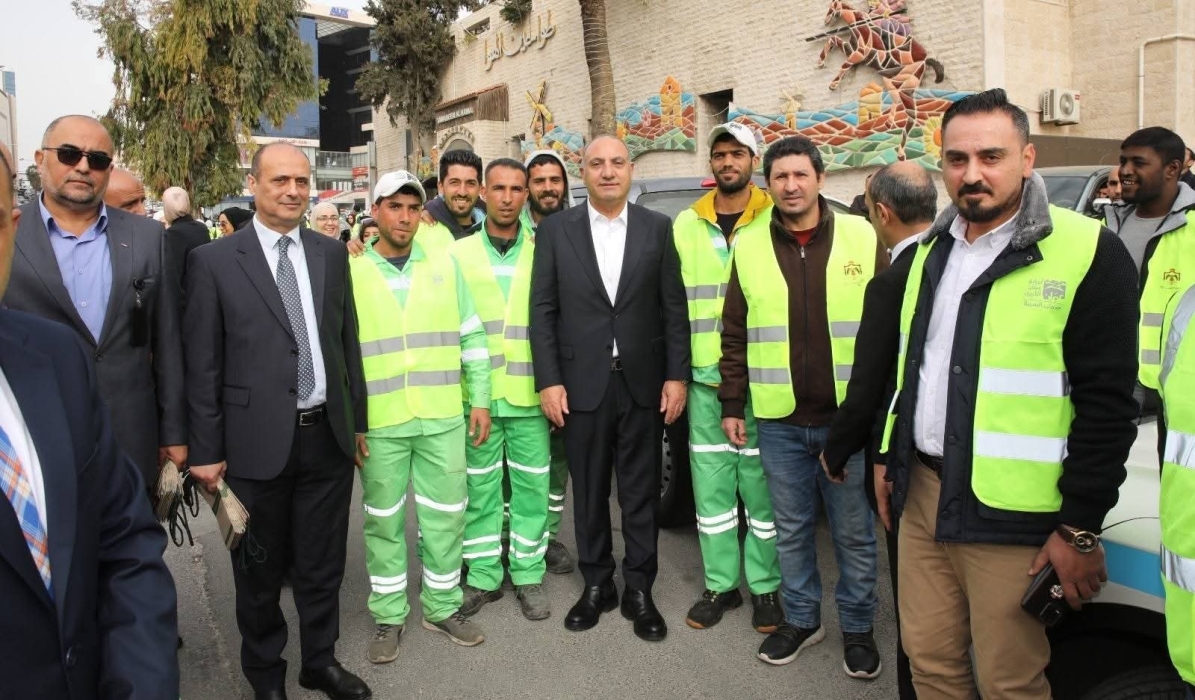 مرتبات الامن العام تشارك بحملة  طريق نظيف