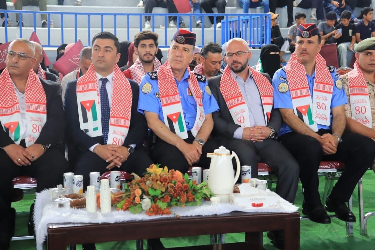 شرطة معان تشارك في احتفال وطني بمناسبة عيد الاستقلال الثمانين  صور